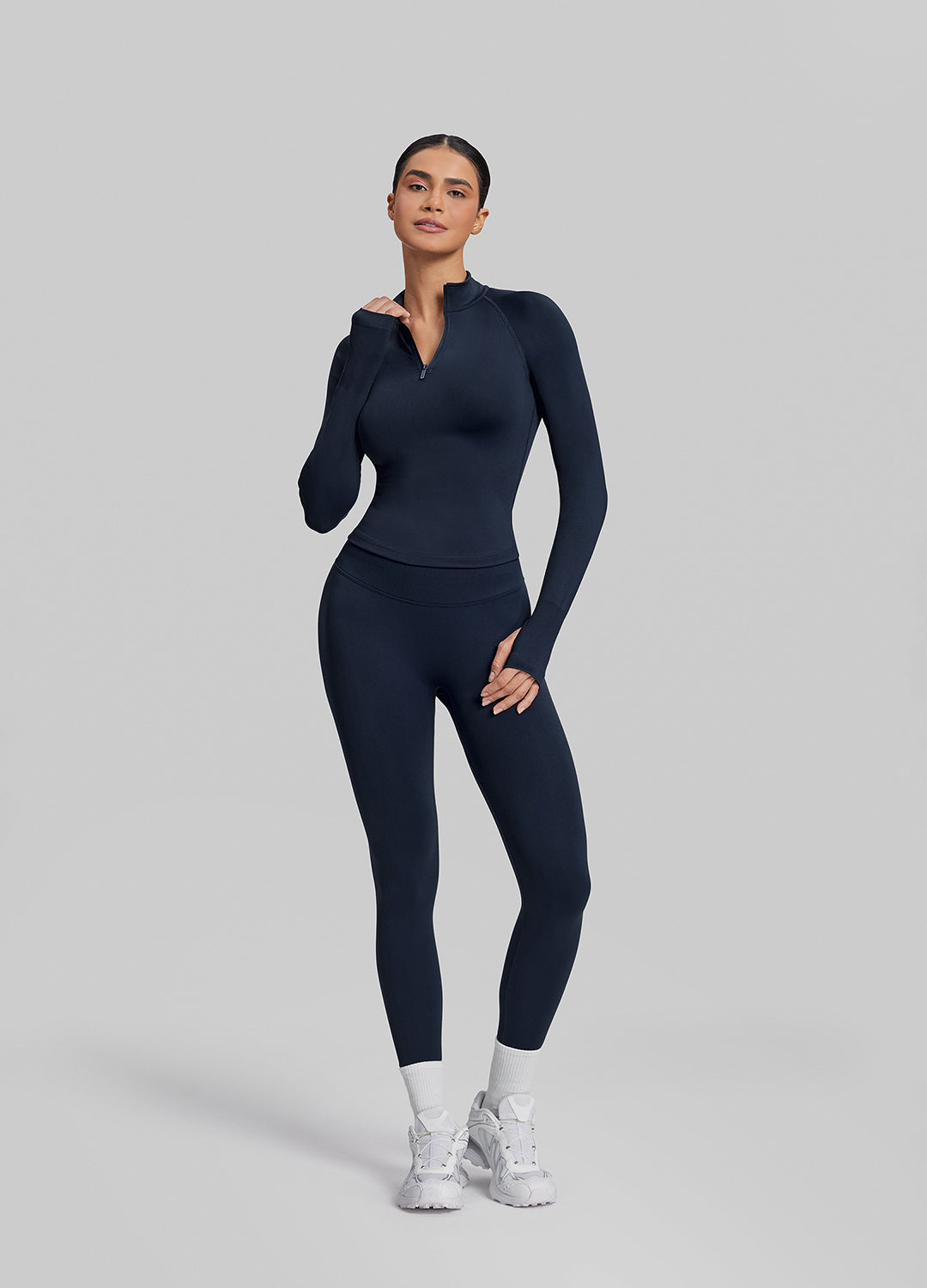 Haut en maille sergée à demi-zip, sans coutures, ajusté, long et avec trous pour les pouces