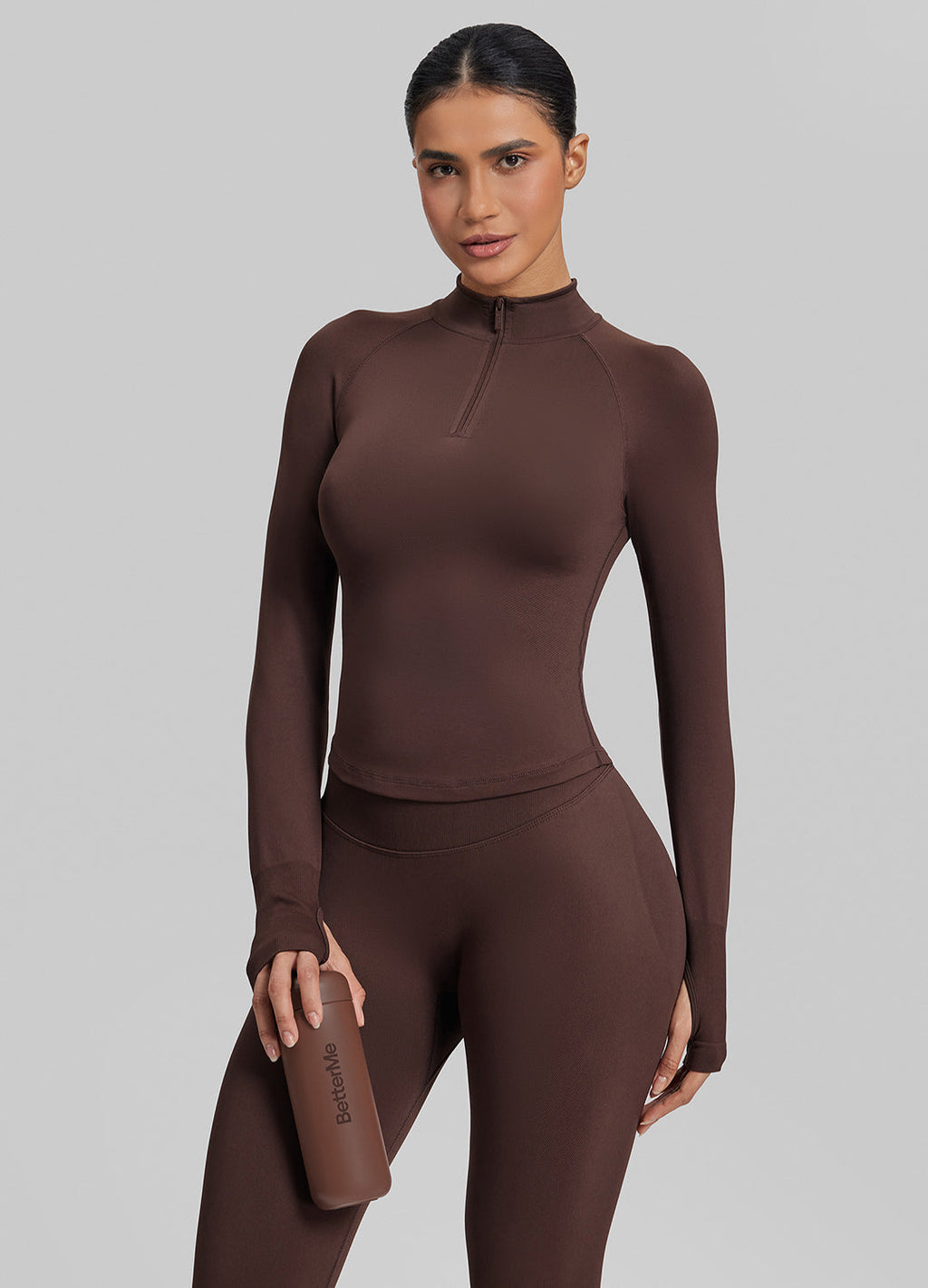 Haut mi-zippé en tricot sergé, sans coutures, moulant, long, avec trous pour les pouces