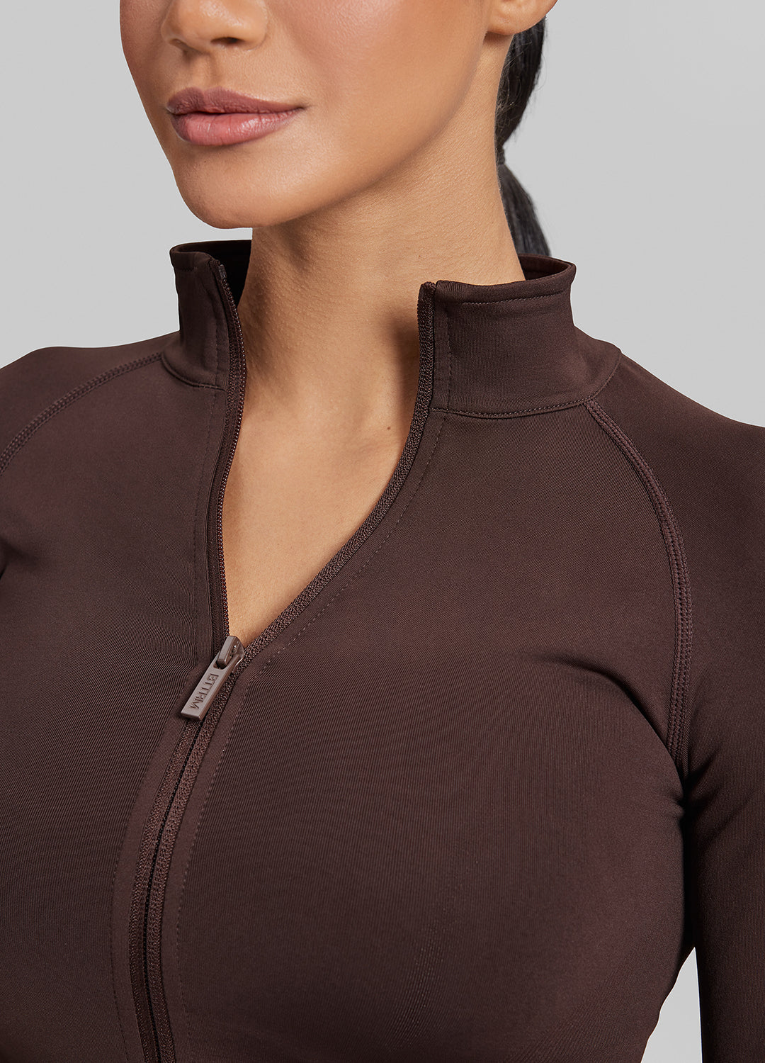 Veste chaude sans coutures respirante à fermeture éclair complète et coupe longue