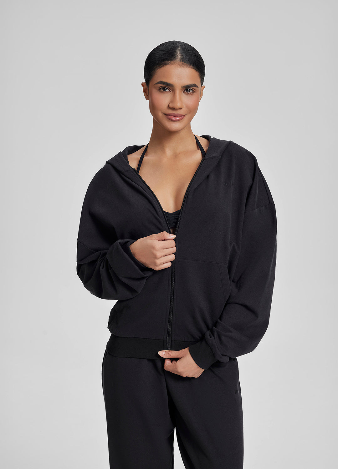 Sweat à capuche doux et ample avec poches kangourou et fermeture éclair intégrale