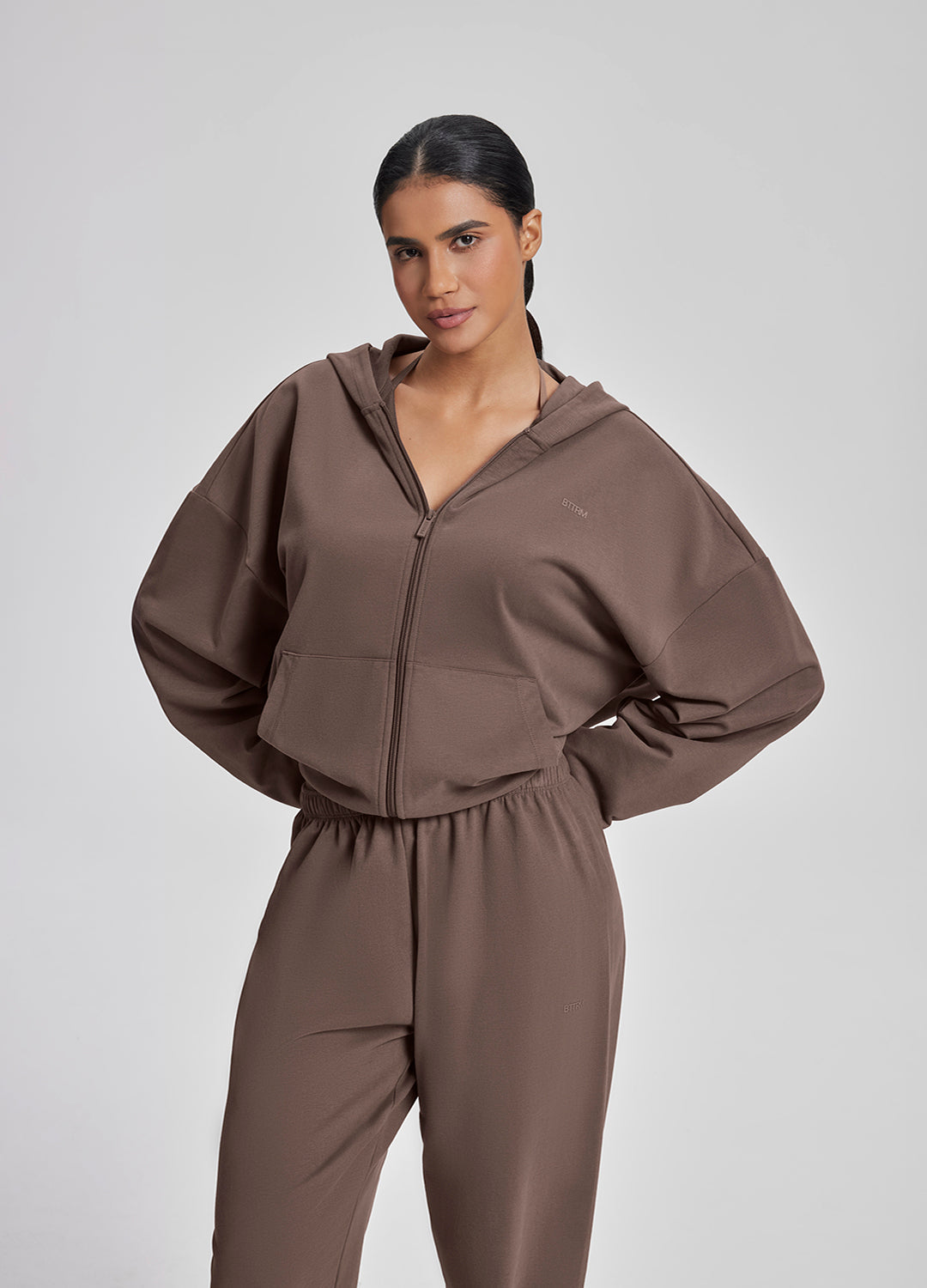 Sweat à capuche doux et ample avec poches kangourou et fermeture éclair intégrale