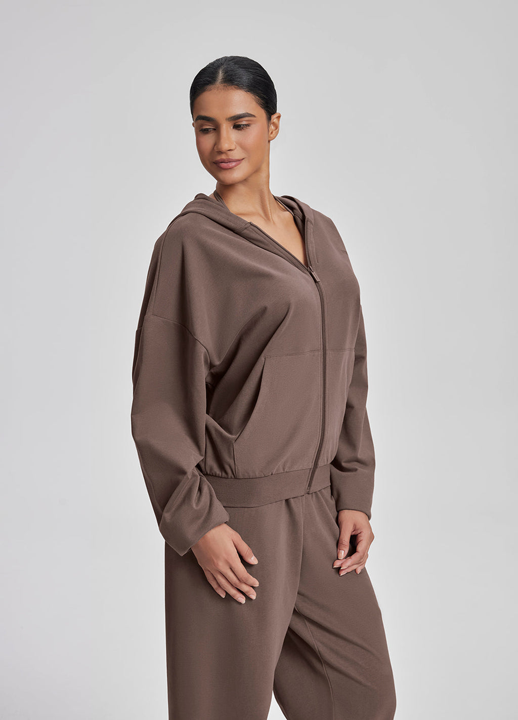 Sweat à capuche doux et ample avec poches kangourou et fermeture éclair intégrale