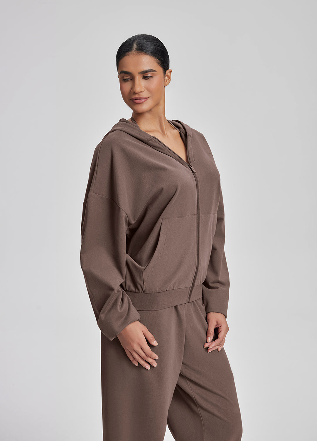 Sweat à capuche doux et ample avec poches kangourou et fermeture éclair intégrale