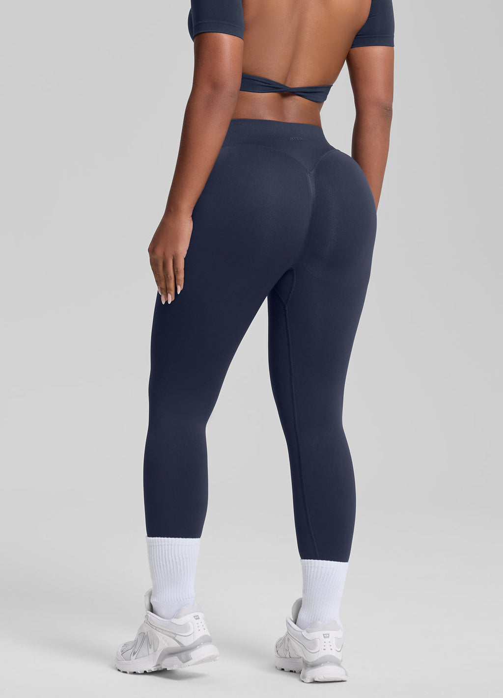 Legging de sport taille haute gainant contrôle ventre effet push-up fessier