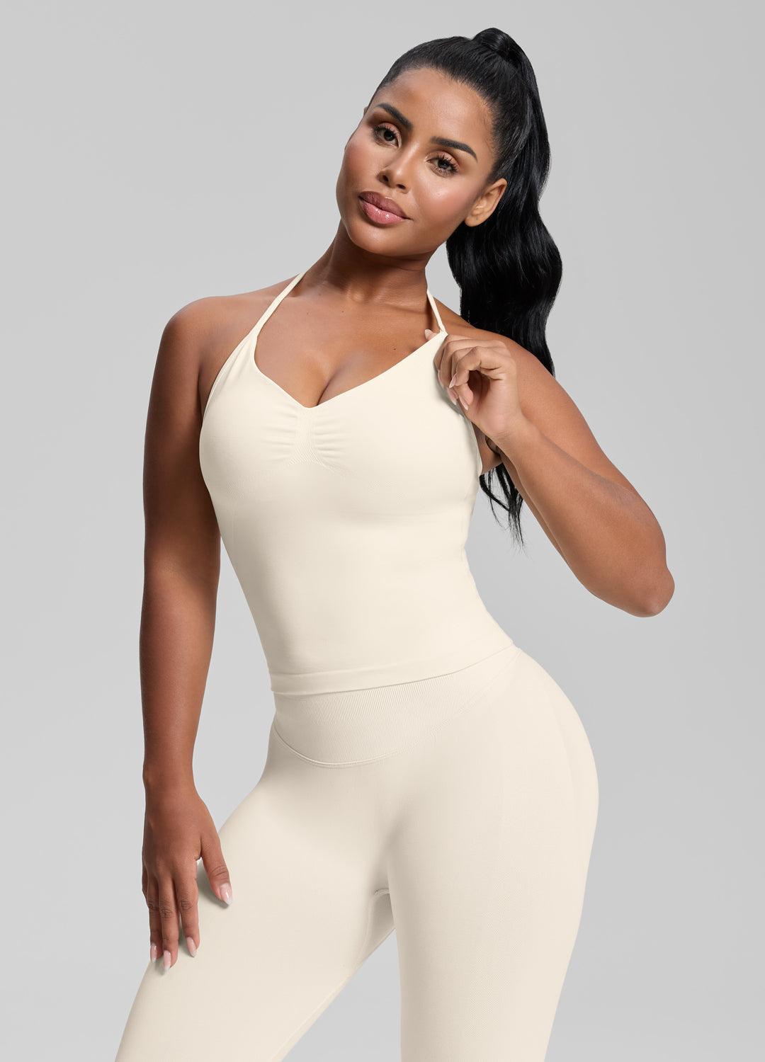 Débardeur en tricot sergé moulant, coupe longue, avec licou et soutien-gorge intégré