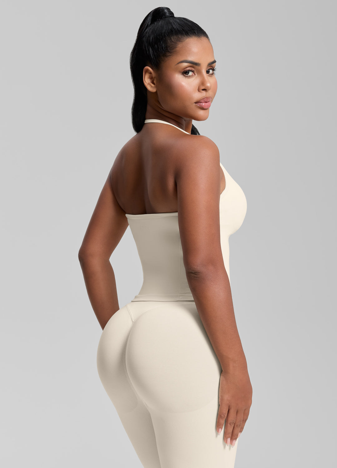 Débardeur en tricot sergé moulant, coupe longue, avec licou et soutien-gorge intégré